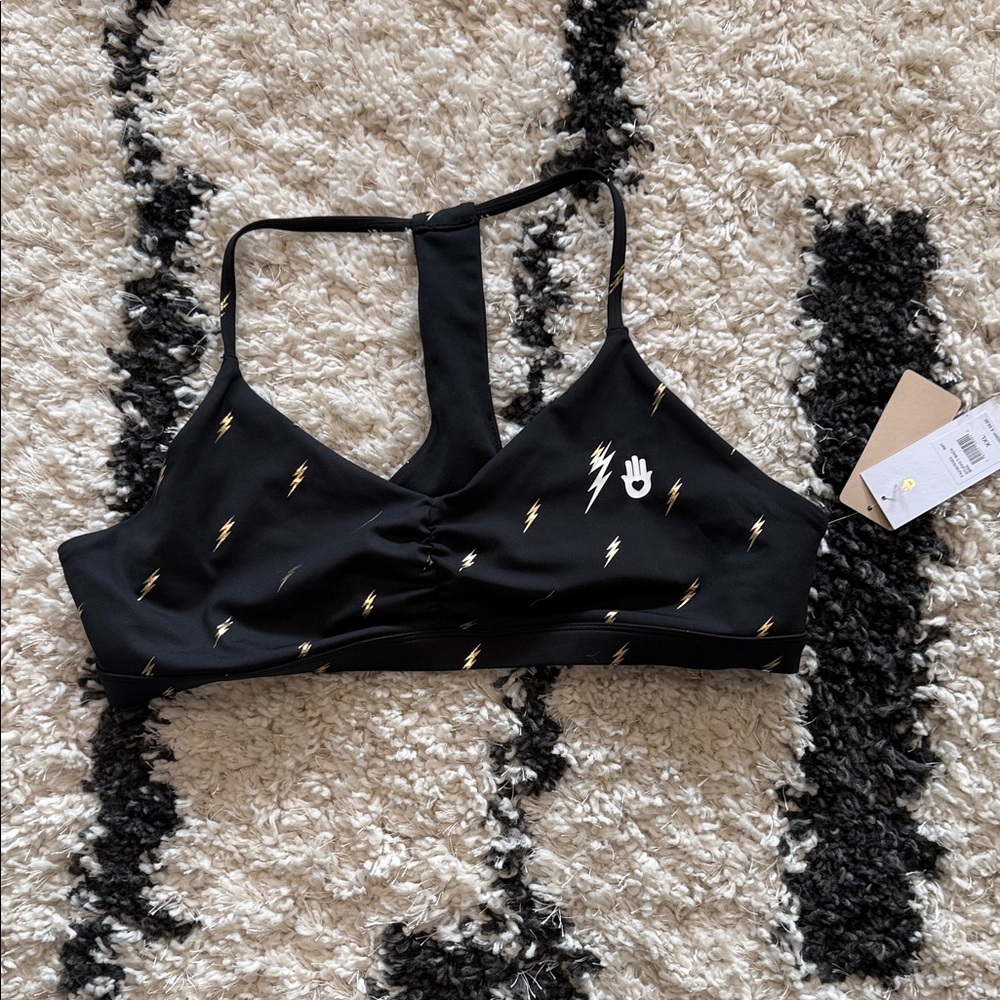 Black Sports Bra with Gold Accents peloton